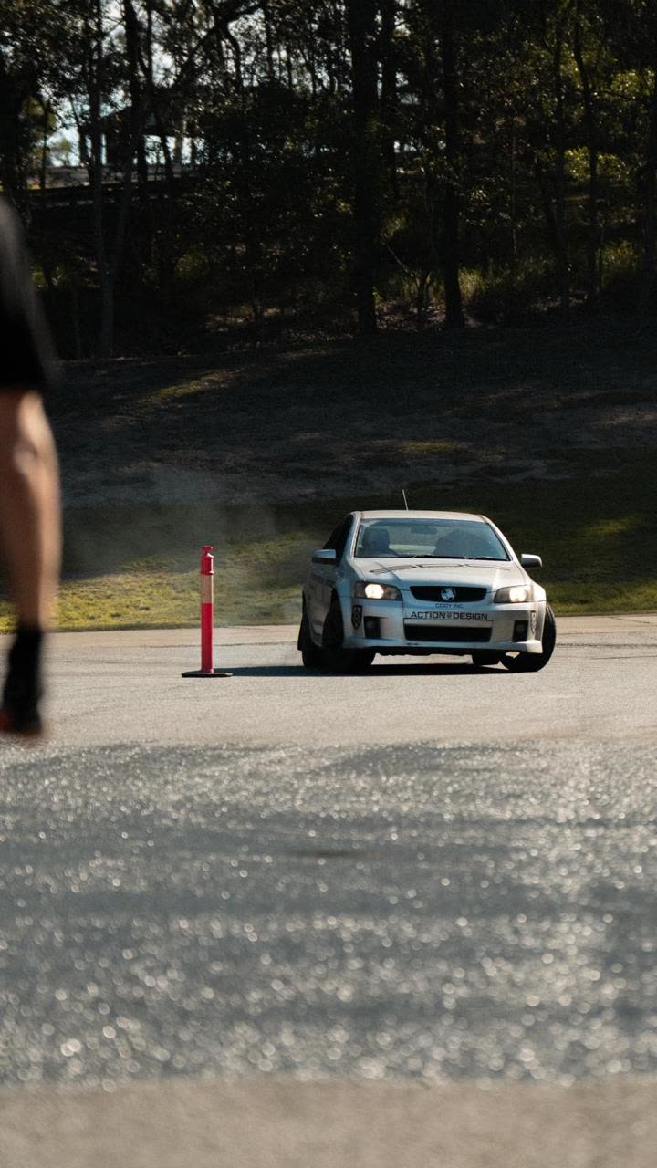 SDC car with door open on the track
