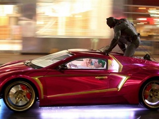 Stunt performer boarding a moving car