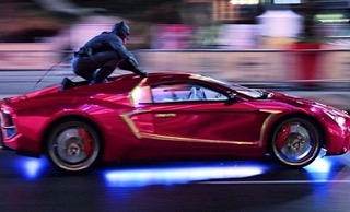 Stunt car under neon on a Suicide Squad shoot